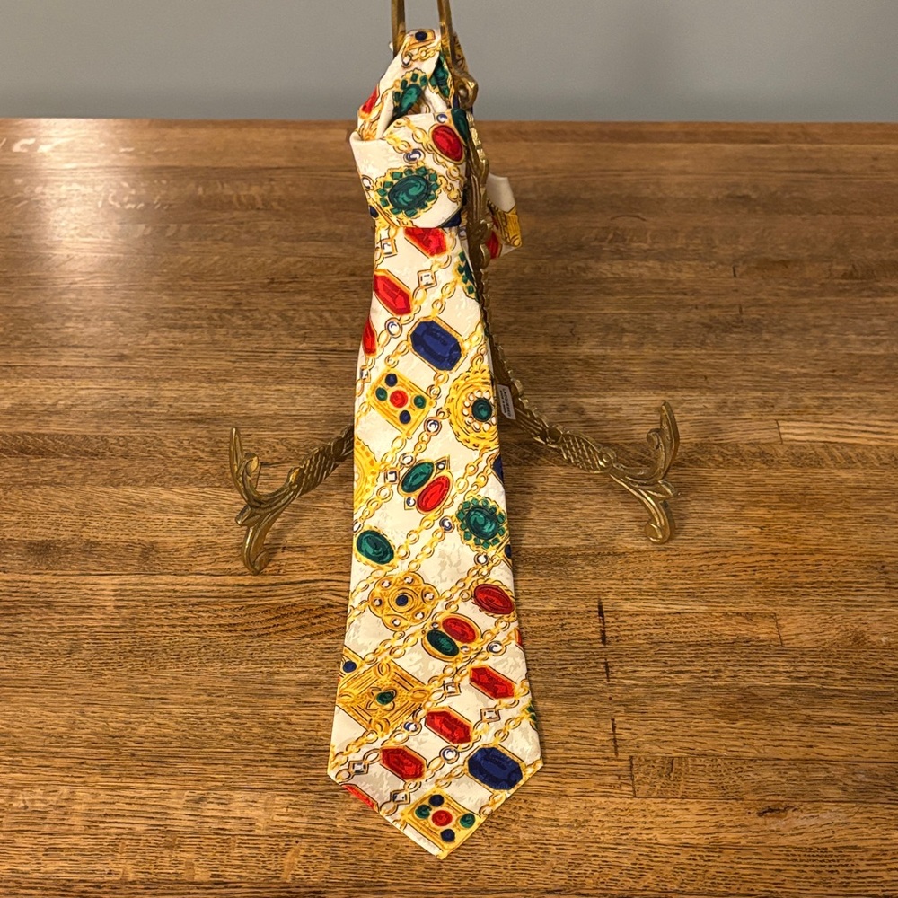 Rich Jewel Tone Patterned (silk?) Tie. Fully lined. In Excellent Condition